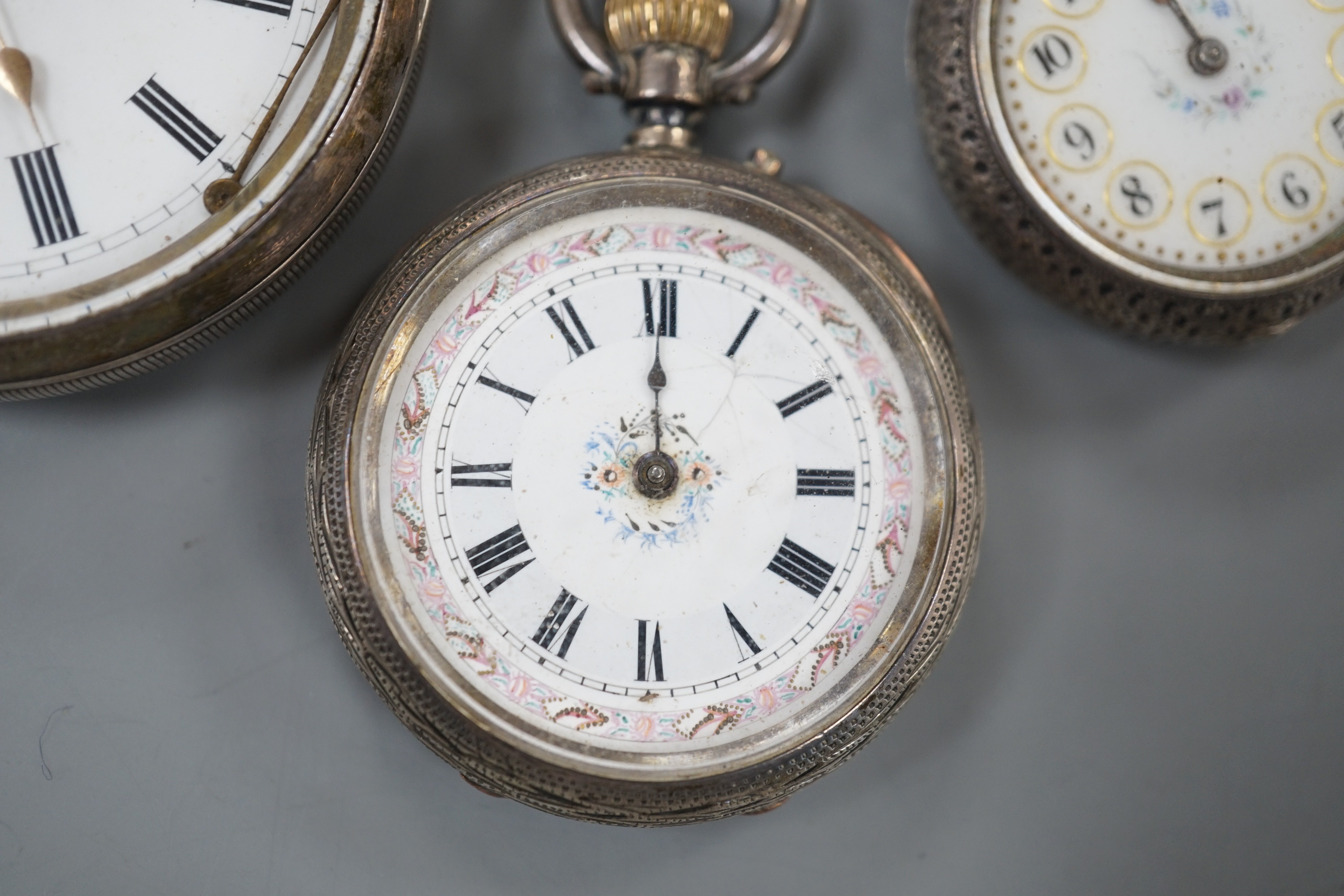 A Swiss 935 white metal open faced pocket watch and two fob watches=, silver a 935 white metal.